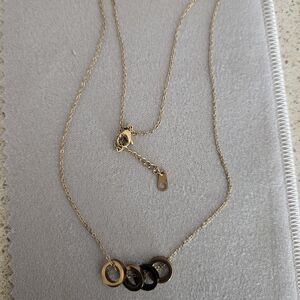 Elegant Gold and Black Necklace
